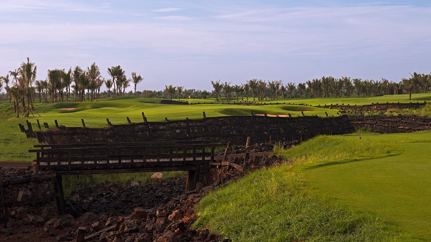 An ancient lava-rock wall beside a fairway at Blackstone