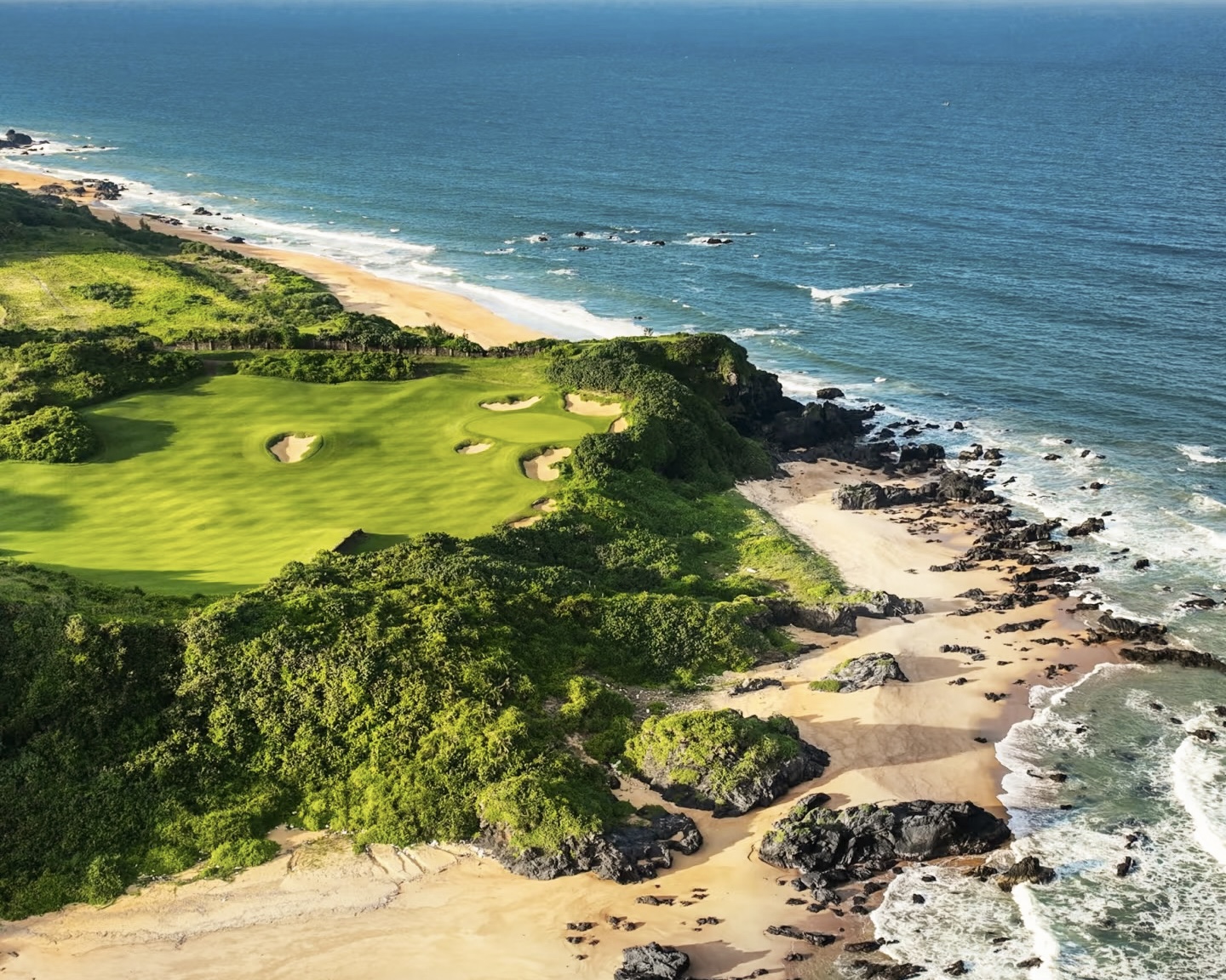 An oceanfront golf hole on the cliffs of Shanqin Bay, Hainan
