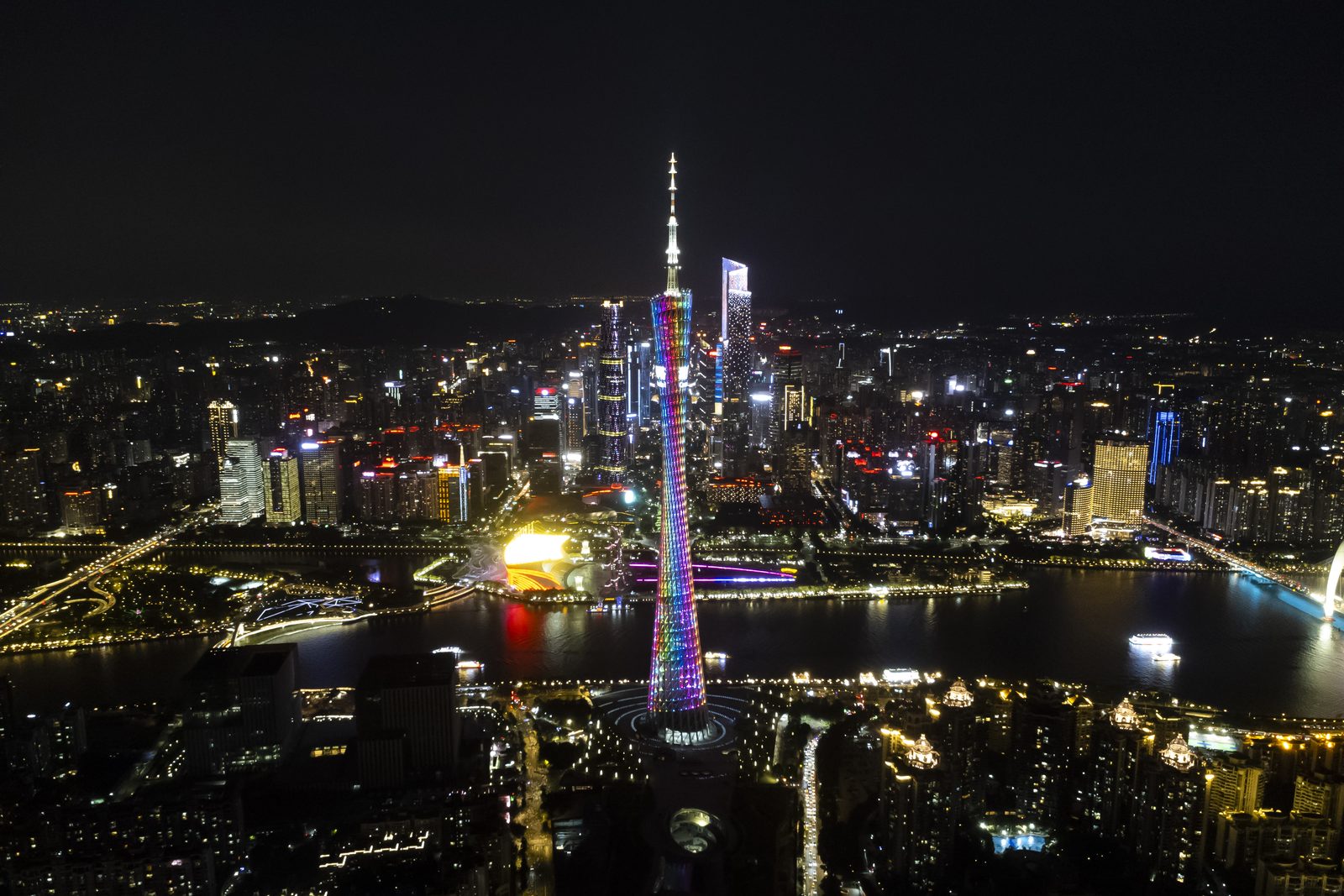 Canton Tower lit up over the Pearl River at night