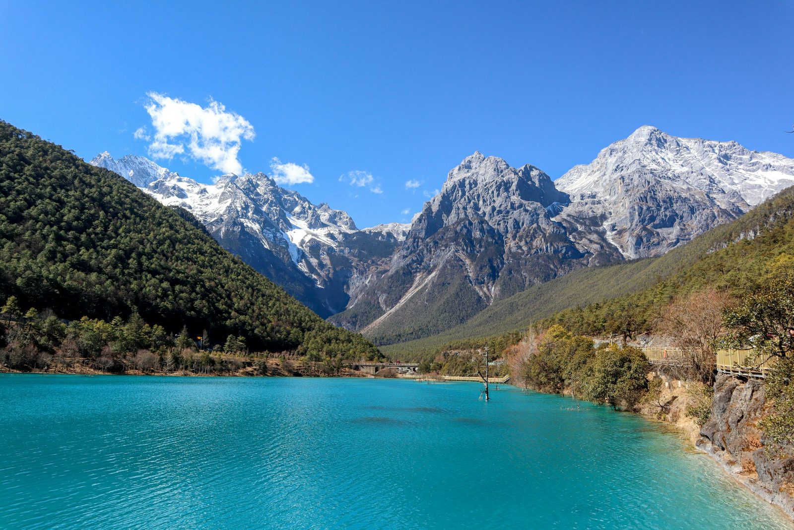 The turquoise water of Blue Moon Valley beneath the snow peaks of Jade Dragon Snow Mountain, Lijiang