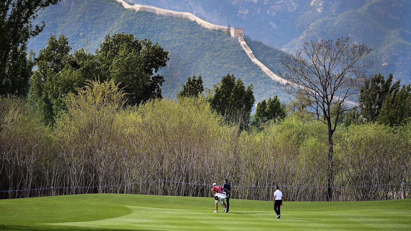 A Reignwood Pine Valley fairway with the Great Wall snaking across the mountains behind