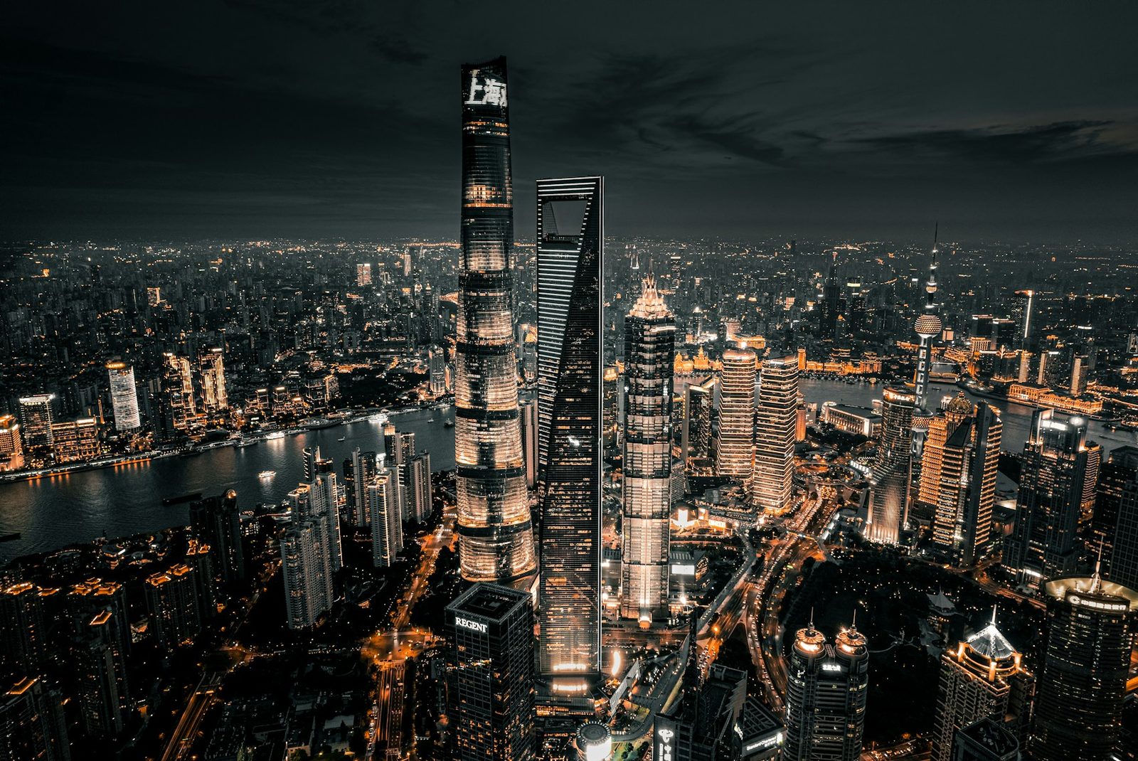 The lit towers of Shanghai seen from above at night
